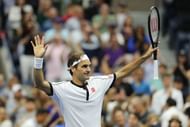 Federer takes in the applause after beating Dzumhur in his 100th match at the US Open